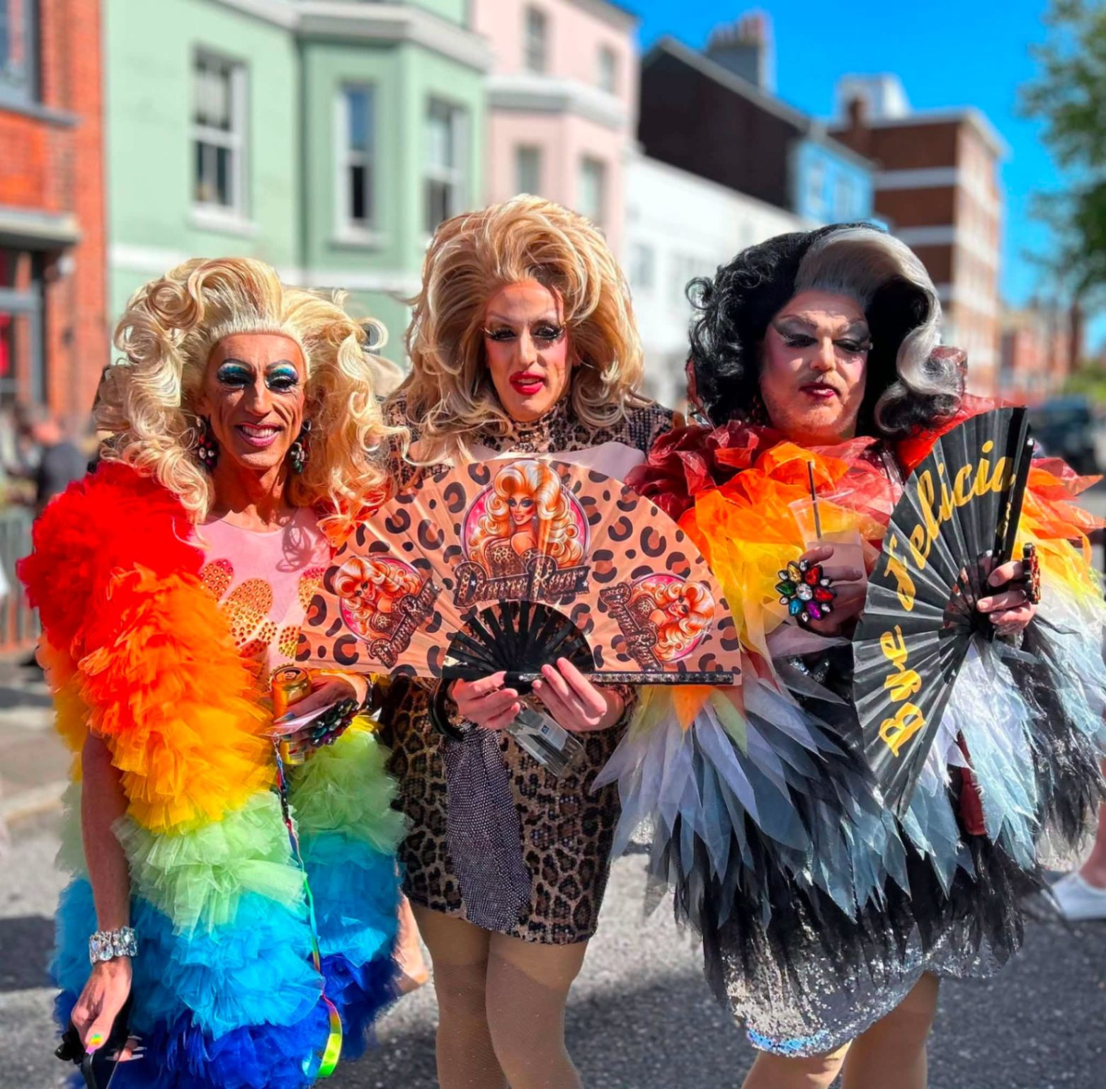 Performers at Eastbourne Pride in vibrant costumes